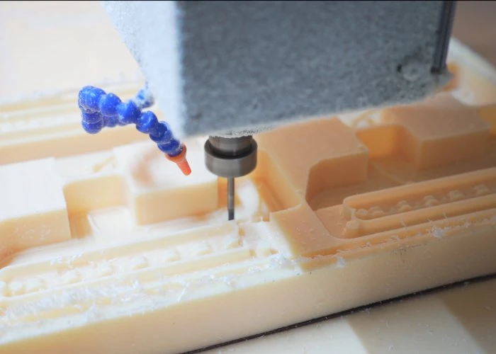 CNC machining ABS plastic parts for prototype development.