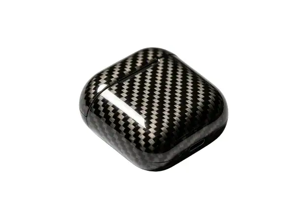 Plastic prototype parts with carbon fiber texture finish.