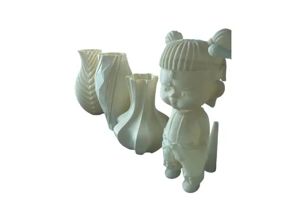 Complex 3D printed parts with detailed features.