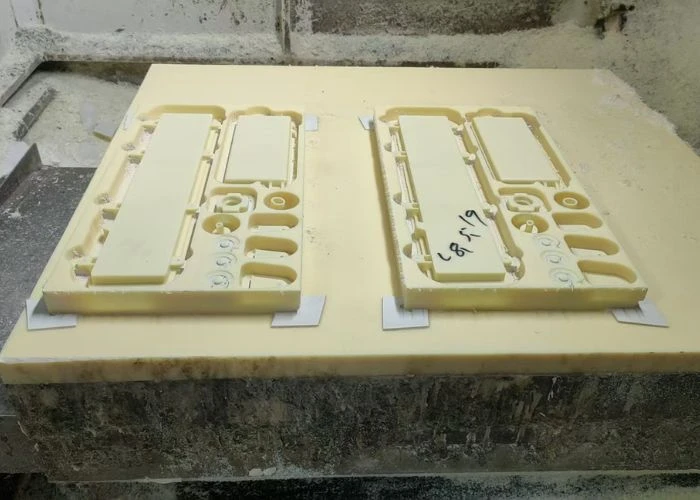 Machined ABS plastic prototypes for design validation.