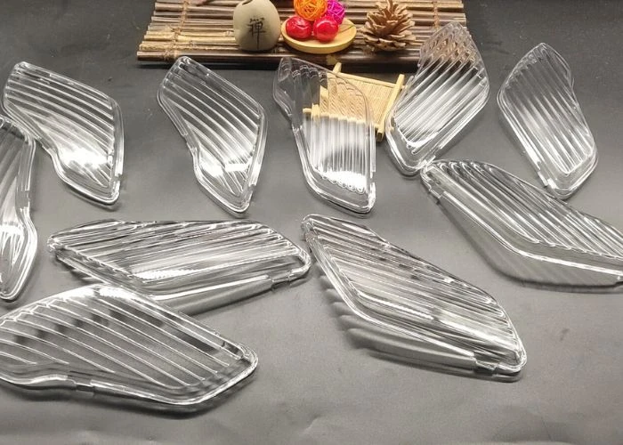 Clear plastic prototype parts with transparent surface finish.