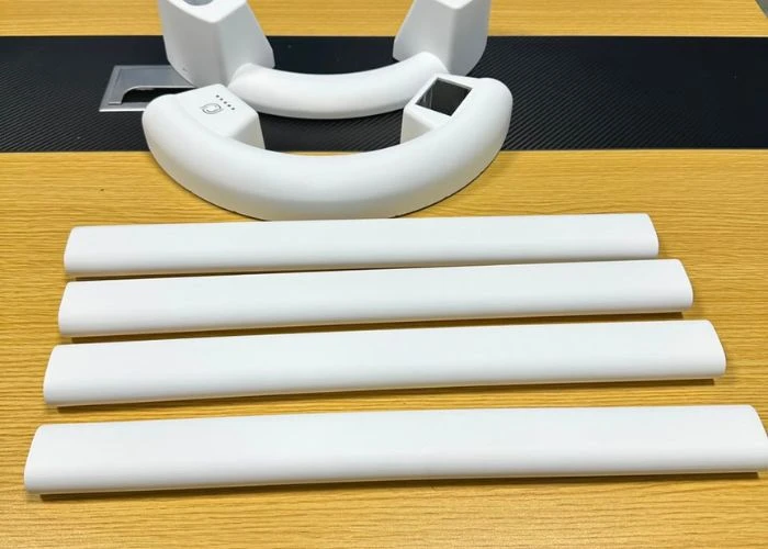 Painted plastic prototype components for product development.