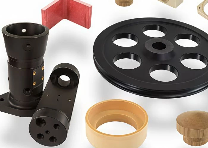 Custom plastic mechanical parts in black orange red, perforated disc and cylindrical bucket components for automation equipment