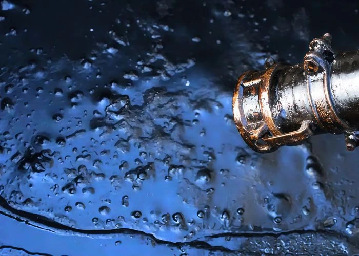 Water sample containing trace tiny plastic particles, microplastic pollution demonstration